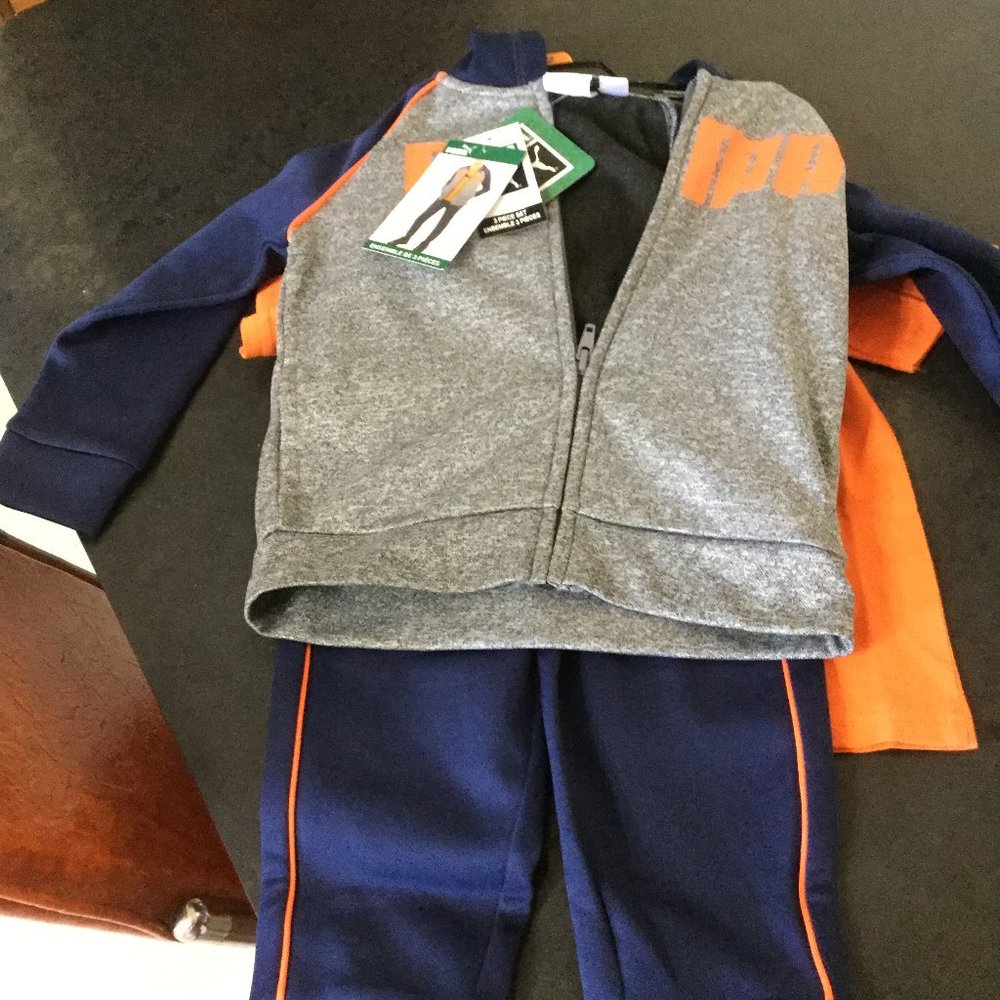 NWT  Puma 3 piece jogging set orange and blue in color size 2 jacket pants  Tee